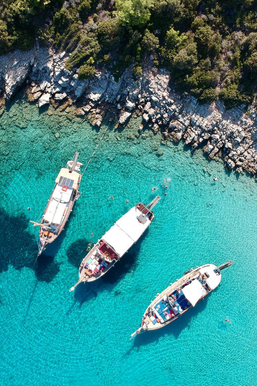 Bodrum: Orak Island Boat Trip with Lunch & Optional Transfer - The Experience on Board: Friendly Staff and Spacious Vessel