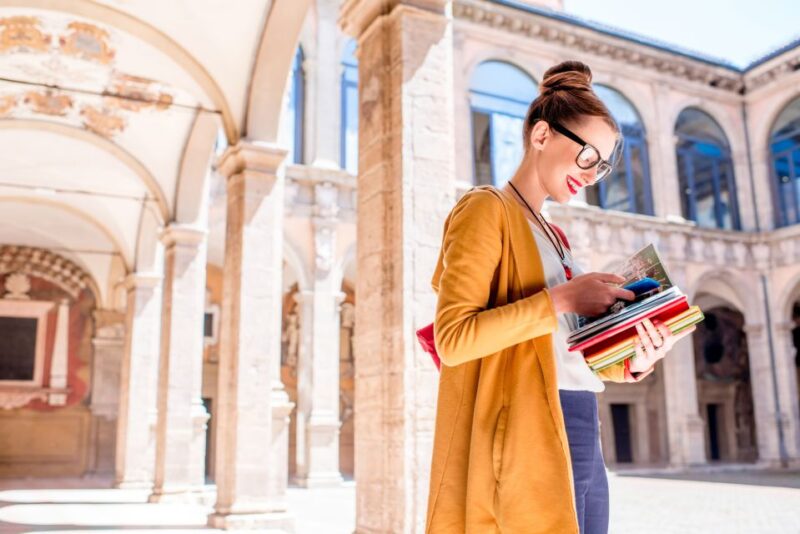 Bologna: Audio-Guided Archiginnasio Visit with Food Tasting - Gallery Walks and Inscriptions: A Visual Journey