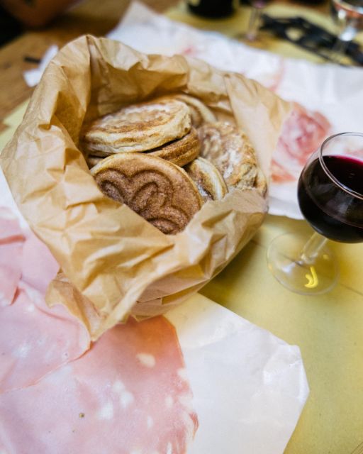 Bologna: Walking Food Tour with a Local Guide - Practicalities: Meeting Point, Booking, and Limitations