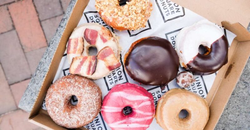Boston: Guided Delicious Donut Tour with Tastings - Walking Along Boston’s Waterfront to the Public Market
