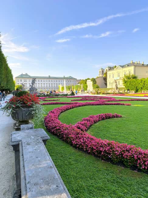 Bratislava or Vienna: Hallstatt & Salzburg Day Trip - Scenic Stop in Traunkirchen with Optional Boat Ride