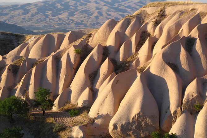 Breathtaking Hot Air Balloon Ride and Best of Cappadocia Tour Package - Exploring the Fairy Chimneys at Devrent Valley