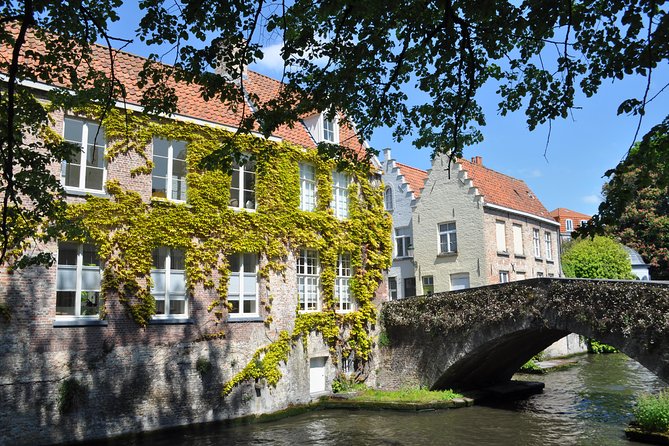 Bruges by bike with friends and family! - The Canal Tower and Ancient Wall Remnants