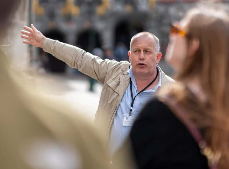 Bruges: Walking Tour, praline, Canal Cruise, and Burger Meal - Guided Walk Through Bruges’ Medieval Streets and Hidden Corners