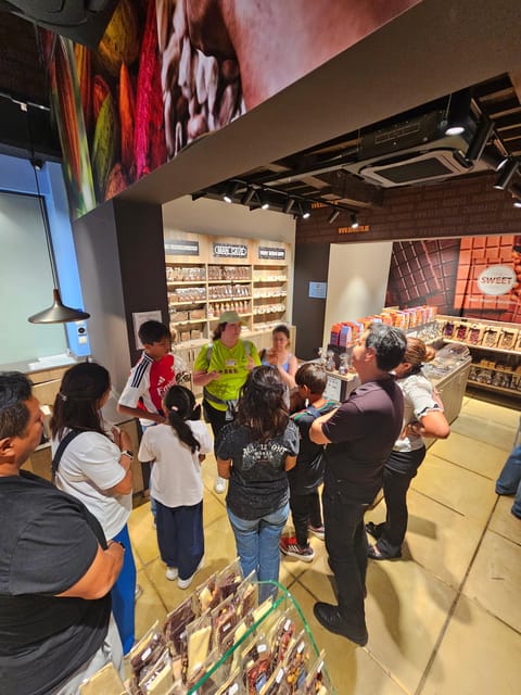 Bruges: Walking Tour with Hot Chocolate & Chocolate Tasting - Indulge in Chocolate at Three Famous Shops