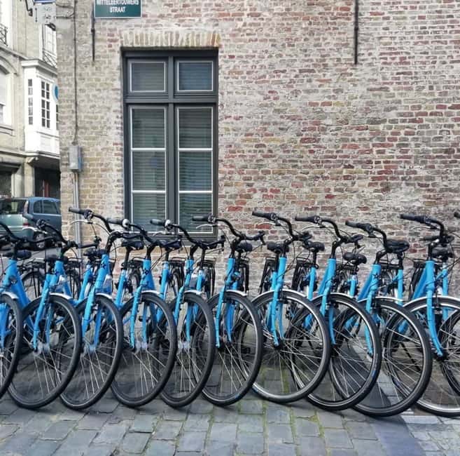 Bruges: Wicked Christmas Bike Tour Experience with a Local - The Surprise Jenever and Hot Drink Stop