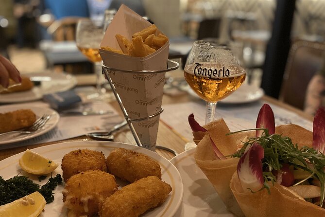 Brussels Walking Food Tour With Secret Food Tours - Welcoming Start at Auguste Orts Statue and Introductory Walk