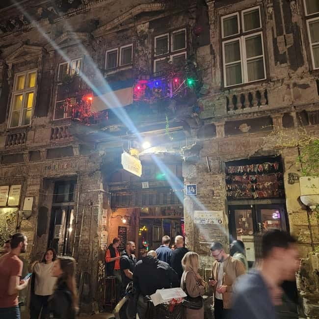 Budapest: Jewish District Night Walking Tour with Drinks - Learning About the District’s Tragic History and Transformation