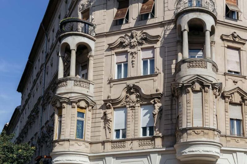Budapest: Old Buda Walking Tour & Folk Music Performance - The Influence of Communist Architecture in Budapest