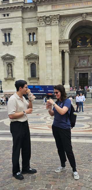 Budapest: Walking Tour with Chimney Cake & Polaroid Photos - Discovering Deák Ferenc Square and Its Transportation Hub
