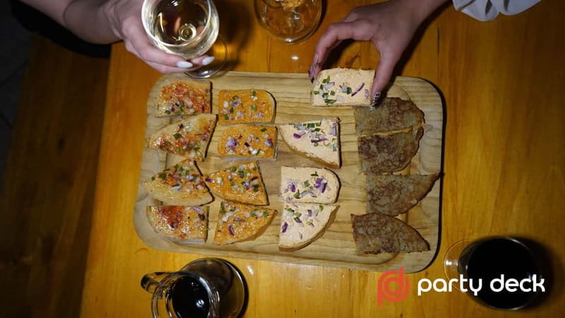 Budapest: Wine Tasting with Fun Games and Delicious Snacks - Paired with Local Cheese, Charcuterie, and Artisan Oils