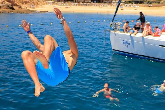 Cabo Catamaran Snorkel Arch and Santa Maria Bay Open Bar Snacks - Cabo San Lucas Departure and Meeting Point at D Dock