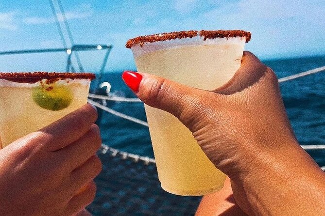 Cabo San Lucas Sunset Cruise with Open Bar and Snacks - The Unique Experience of Sitting on the Net Over Water