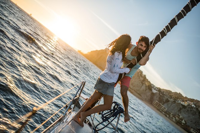 Cabo San Lucas Sunset Sailing Shared Cruise - Savoring Drinks and Snacks Onboard
