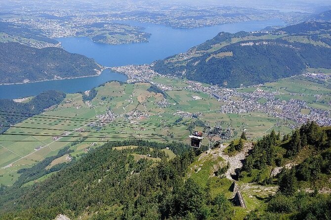 CabriO World's first Open Top Cable Car Ticket to Mt Stanserhorn - Enjoying the Revolving Mountain Restaurant