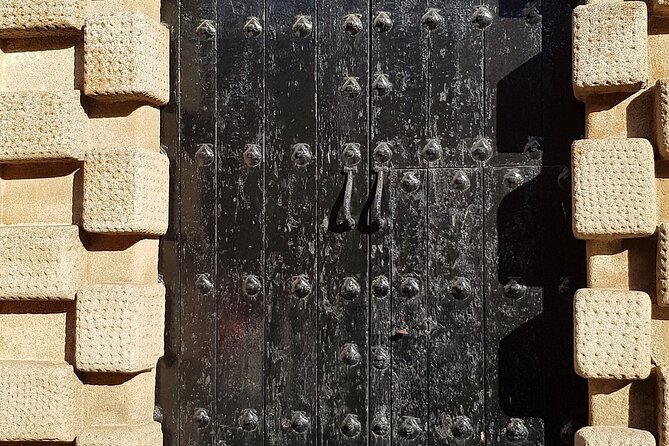 Cáceres Private Historic Walking Tour - Passing by the Palace of Golfines de Abajo