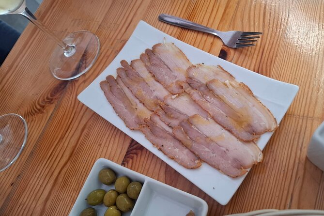 Cadiz Food Tour: Tapas, Drinks and Delights with a Local - Sampling Pescaito frito in Plaza de Las Flores