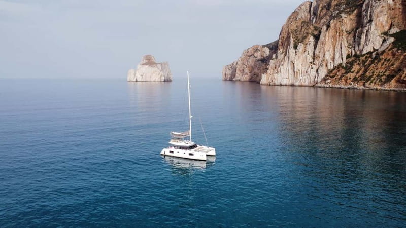 Cagliari: Catamaran Tour to the Gulf of the Angels - Swimming and Snorkeling at Poetto Beach