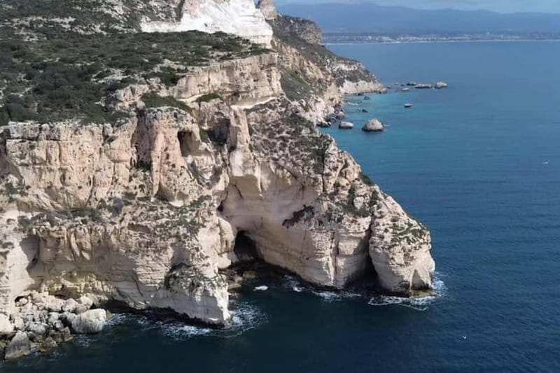 Cagliari: Catamaran Trip with 3 Stops and Prosecco Toast - The Guide’s Storytelling and Local Legends