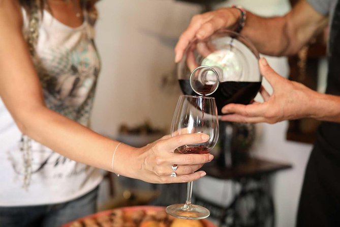 Cagliari: cultural walking tour, food and wine tasting experience - Visiting Local Shops for Sardinian Food Samples