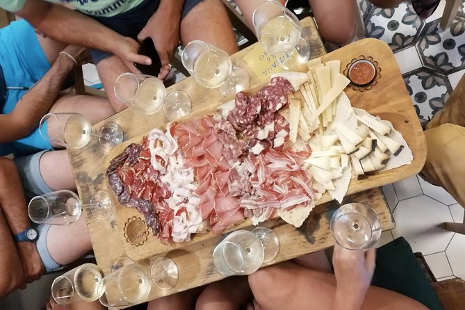 Cagliari: cultural walking tour, food and wine tasting experience - Logistics and Group Size for an Intimate Experience