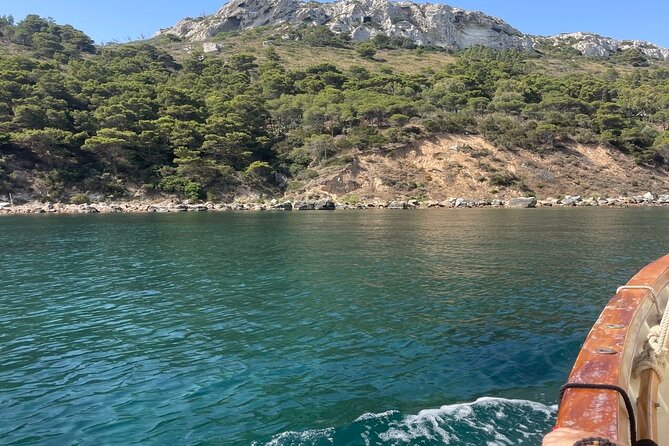 Cagliari Gulf Boat tour : 5 stops, snorkeling & local aperitif - Poetto Beach and the Sardinian Aperitif