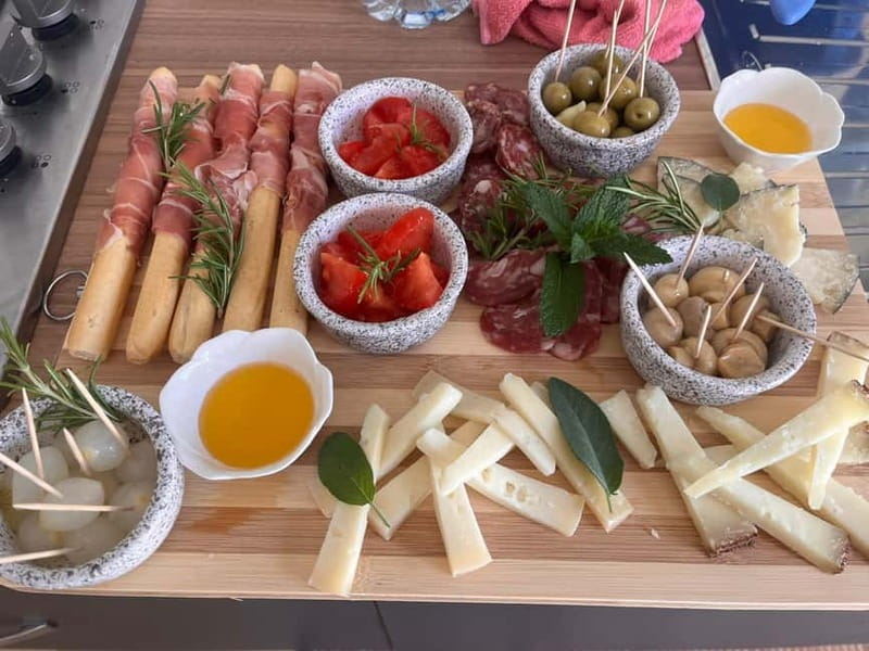 Cagliari Home Cooking Class: Pasta, Wine & Sardinian Flavors - Savor Sardinian Antipasti, Wines, and Homemade Mirto