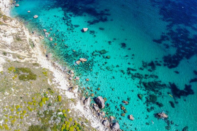 Cagliari: Luxury Motorboat Tour with 3 Swim Stops & Wine - The Experience of the Guides and Crew