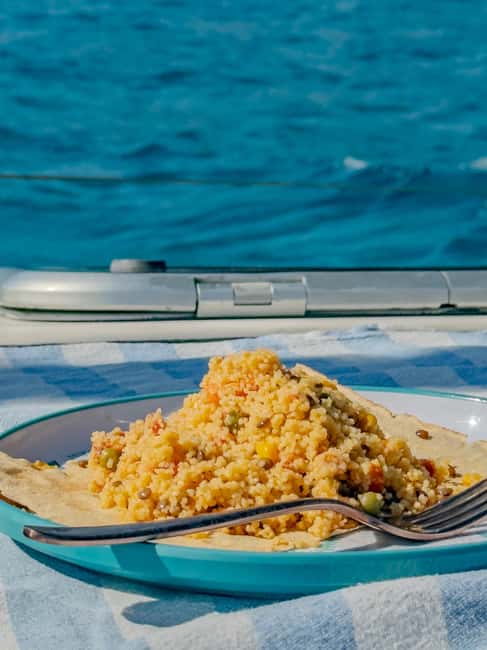Cagliari: Mari Pintau Sailing Trip with Lunch & Snorkeling - Sardinian Lunch on Deck: Flavors and Atmosphere