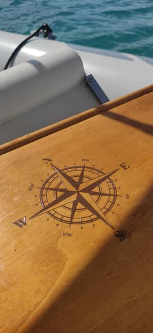 Cagliari: Sella del Diavolo Boat Magic Tour Drinks & Snacks - Food, Drinks, and Onboard Atmosphere