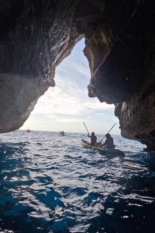 Cala en Porter: Menorca Caves Kayaking Tour & GoPro Photos - Exciting Kayaking Adventure with Cave Exploration and Snorkeling in Menorca
