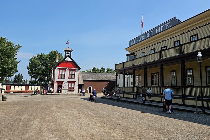 Calgary City Tour and Yamnuska Wolfdog Sanctuary Private Tour - Exploring Heritage Parks Historic Charm