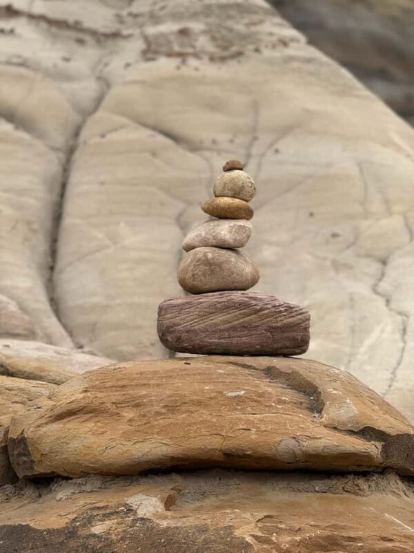 Calgary: Drumheller and Badlands Tour with Museum Entry - Crossing the Star Mine Suspension Bridge