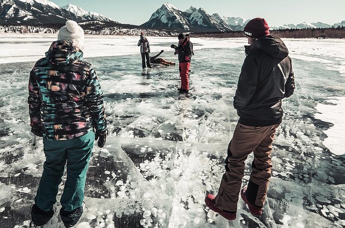 Canadian Rockies Abraham Lake Ice Bubbles Helicopter Tour - Returning Route and Tour Duration
