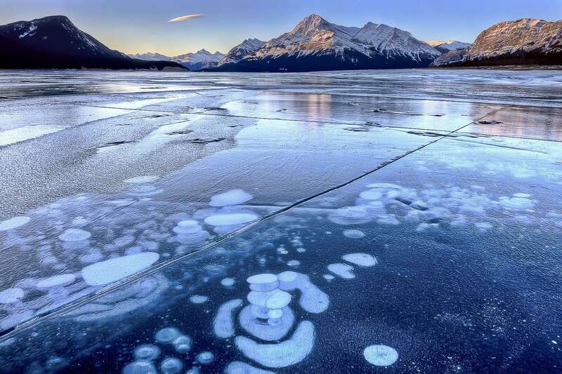 Canadian Rockies: Abraham Lake Ice Bubbles Helicopter Tour - Abraham Lake Ice Bubbles: The Natural Phenomenon Close-Up