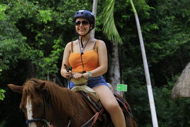 Cancun Adventure Tour with Ziplines, ATVs and Cenote Swim - Cooling Off in a Limestone Cenote