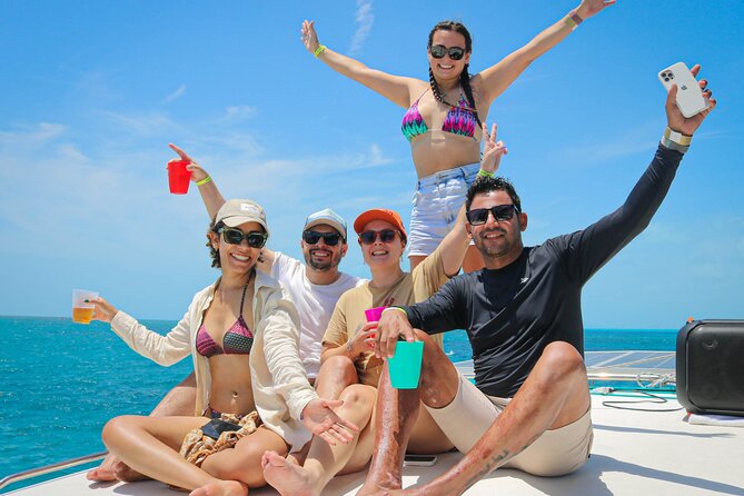 Cancun Catamaran: Isla Mujeres, Snorkeling, Drinks & Buffet Lunch - Snorkeling at El Meco Reef: A Splash of Color