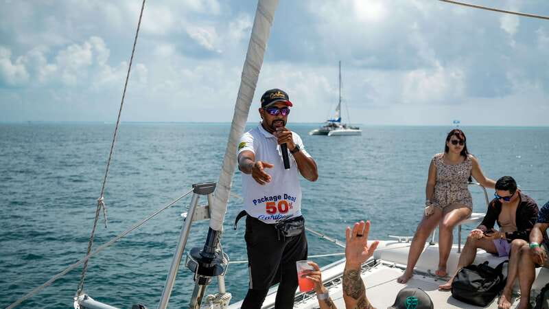 Cancún Catamaran to Isla Mujeres + Snorkel, Open Bar & Lunch - Buffet Lunch and Unlimited Drinks at a Private Beach Club