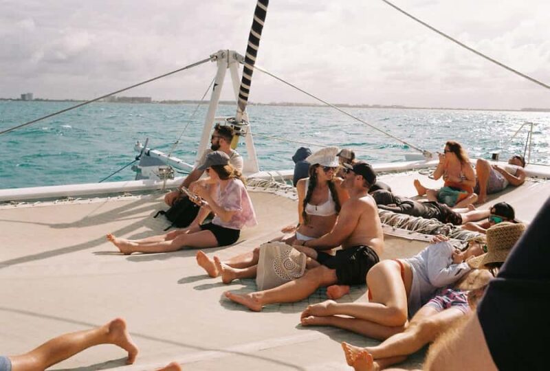 Cancún: Catamaran Tour to Isla Mujeres with Open Bar & Lunch - Snorkeling at El Meco Reef: Marine Life and Underwater Art
