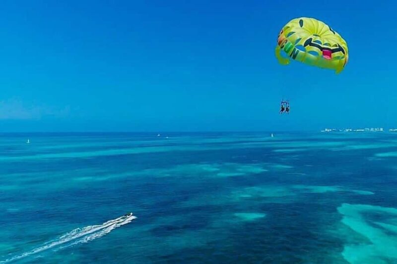 Cancun Combo Tour: 4-Reef Stop Snorkeling and Parasail Ride - Cancun’s 260-Foot Parasailing with Stunning Caribbean Views