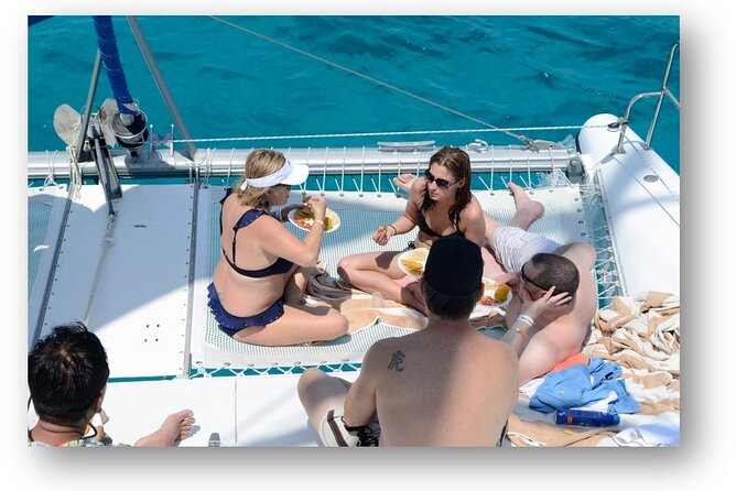 Cancun Half Day Sailing Cataman Cruise to Isla Mujeres - Practical Details: Meeting, Transportation, and Booking