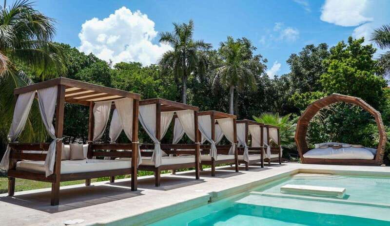 Cancun: Isla Mujeres All-Inclusive Catamaran with pick-up - Beach Club Lunch and Relaxation