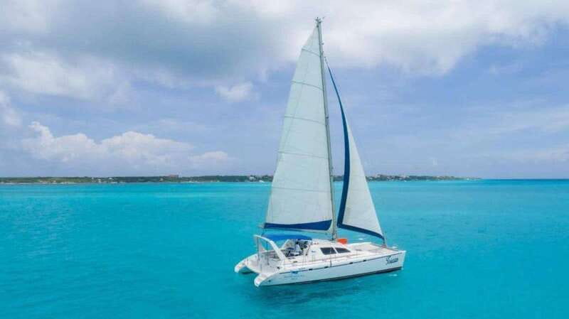 Cancun: Isla Mujeres Premium Catamaran Half-Day Tour - Snorkeling at a Hidden Caribbean Reef