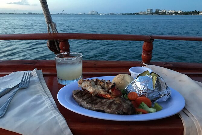 Cancun Lagoon Sunset Sailing Trip aboard classic Galeón with Dinner and Free bar - Live Saxophone Music and the Relaxed Atmosphere