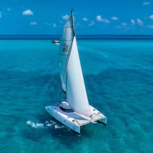 Cancun: Premium Catamaran with Transportation & Dock fee - Sailing to Isla Mujeres