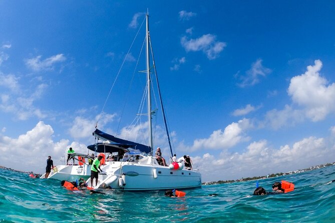 Cancun Sailing Catamaran Islas Mujeres With Luxury Beach Club - Key Points