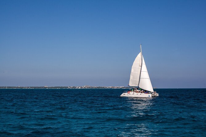 Cancun Sailing Catamaran Islas Mujeres With Luxury Beach Club - Sailing on a Luxurious Catamaran Through Cancun’s Waters