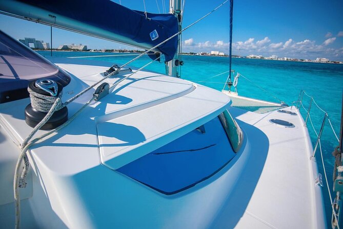 Cancun Sailing Catamaran Islas Mujeres With Luxury Beach Club - The Atmosphere and Group Experience