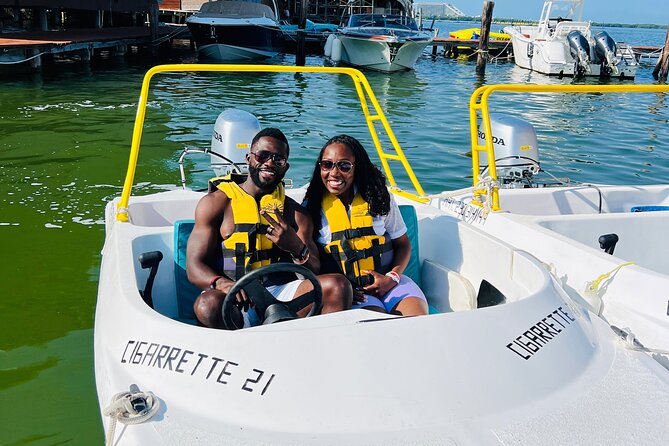 Cancun Speed Boat, Parasailing and Dolphin Beach with Transport - Relaxing at Playa Delfines and the Cancun Sign