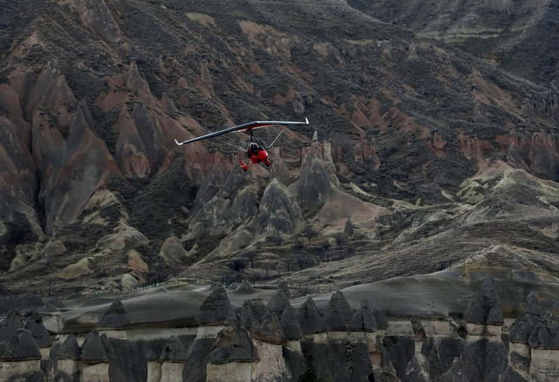 Cappadocia: Motor Paragliding Over Göreme w/Hotel Tranfers - Key Points